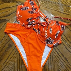 Orange floral bikini size Medium . NWOT.